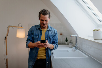 Young man using his phone
