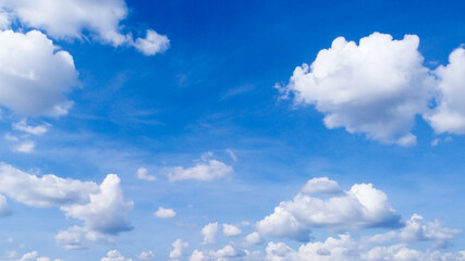 Naklejka na ściany i meble Bright blue sky and white clouds