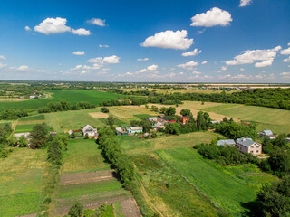 Top view of rural houses surrounded by fields in central Russia