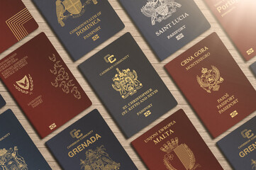 Different foreign passports from many countries by the world as colorful background , European passports, passports of Caribbean countries
