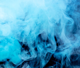 Blue smoke isolated on black background.