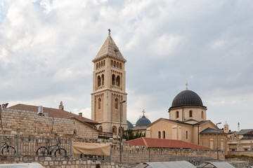 Obraz premium View from the roof of the house to the Lutheran Church of the Redeemer and Orthodox Alexander Nevsky Church in the old city of Jerusalem, in Israel