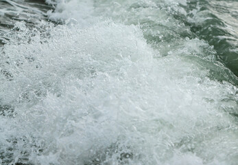 Wave in the sea with splashing water.
