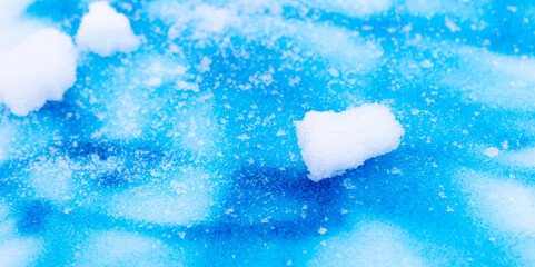 Blue paint on the snow in winter.