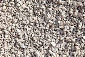 Stone gravel at a construction site as a background.