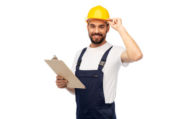 profession, construction and building - happy smiling male worker or builder in helmet with clipboard over white background