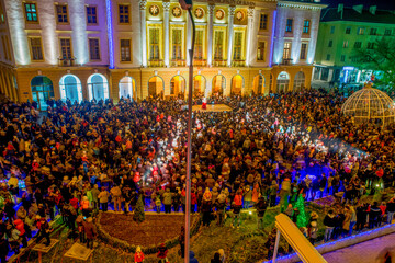 Bulgaria - December 6th 2016: Crowd gathered in a city square in winter watching a Christmas show