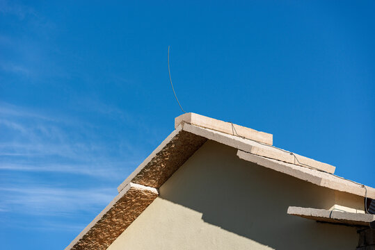 Closeup of a traditional stone roof with a lightning rod of a house on the Lessinia Plateau, Alps, Verona Province, Veneto, Italy, Europe.