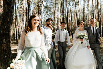 international wedding with friends,close friends congratulate the newlyweds,cheerful and happy...