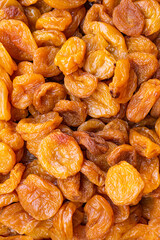 Light brown dried apricots. Safe, natural sweets for the child
