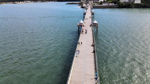 Menai Strait Pier In Wales Infront Of Snowdonia Landscape Tourism