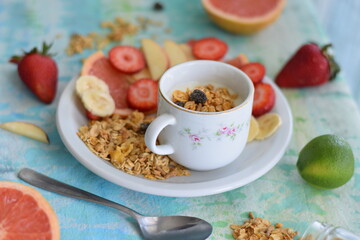 Yogurt with seasonal fruits and granola.