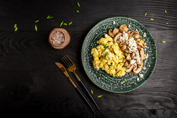 healthy breakfast scrambled eggs with mushrooms and cottage cheese. banner, menu recipe place for text, top view