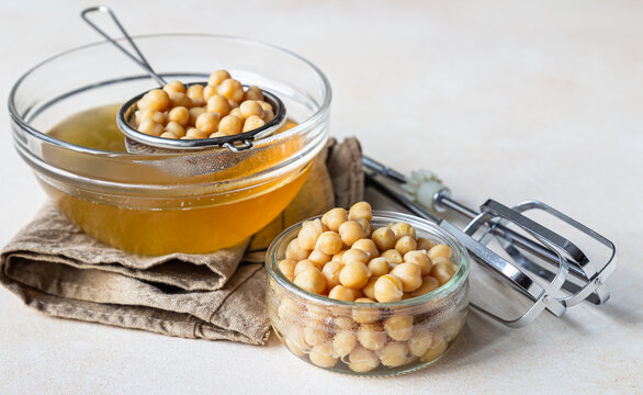 Boiled chickpea and aquafaba. Egg replacement for vegan recipe. Vegan cooking concept. Healthy product.