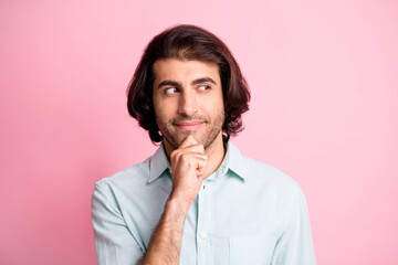 Close up photo of nice person thinking arm on chin look empty space isolated on pink color background