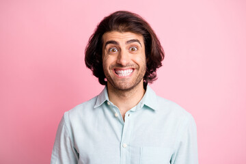 Close up photo of delighted young man impressed face look camera isolated on pastel pink color background