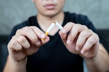 Men quit smoking for good health.