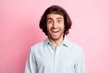 Close up photo of impressed satisfied person toothy smile good news isolated on pink color background