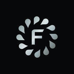Fototapeta na wymiar Logo Design for Letter F. Silver Letter F logo design isolated on black background.Silver Vector jewelry concept.