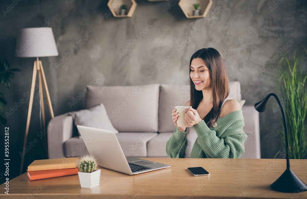 Sticker profile photo of optimistic brunette girl from home hold cup look laptop wear green shirt indoors