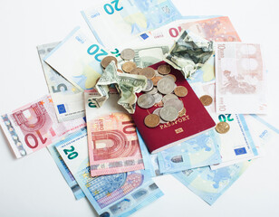 Cash on table isolated: dollars, euro, rubl broken money. All in mess, global crisis . passport travel concept
