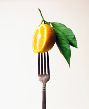 Orange on a fork