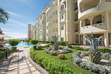 Swimming pool and gardens in a luxury tropical hotel resort