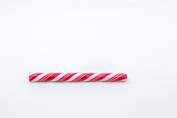 Red and White candy cane Christmas decorations, concept of Holidays loading. Christmas composition. Christmas, winter, new year concept. Flat lay, top view, copy space.