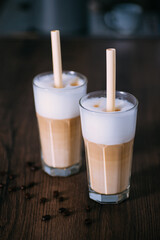 cappuccino, latte with natural sticks, reed tubes