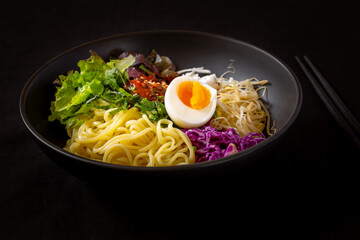 Korean food, JJolmyeon which is mixed with cold chewy noodles with vegetables and spicy sauce