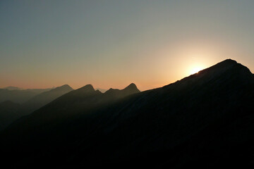 Sunset at mountain crossing Ammergau Alps