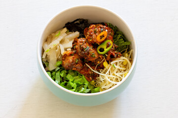 Korean food, Kkomag Bibimbab which is mixed with rice, vegetables and blood cockle