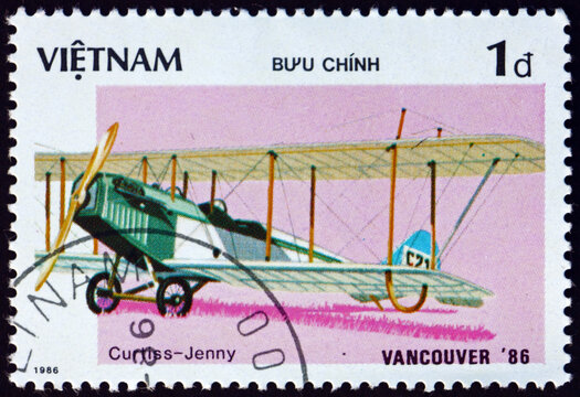Postage stamp Vietnam 1986 Curtiss Jenny, biplane