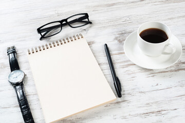 Still life of office workspace with cup of coffee