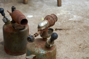 Photo of two gasoline blowtorchs