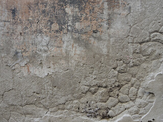 Dirty decandent wall with cracks.