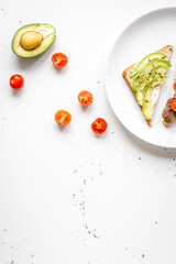 healthy breakfast with sandwiches set on plate on white background top view mockup