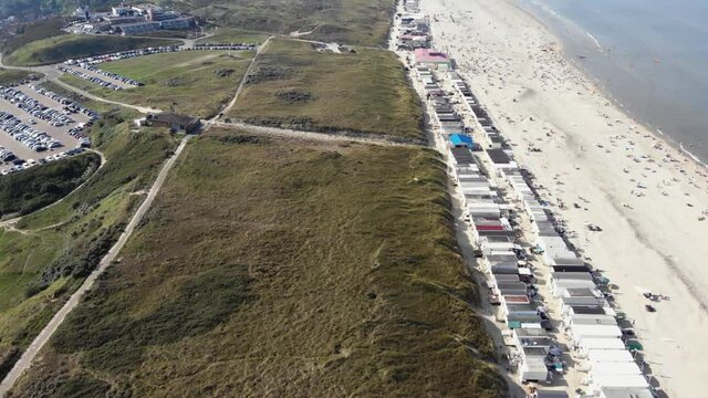 Seascape with houses near the beach in Wijk aan Zee, North Holland, the Netherlands - Fly Over Aerial shot