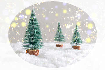 Christmas toy trees on simulated snow. Beautiful festive background for postcards, web, print....