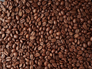 top view of fresh roasted coffee beans background