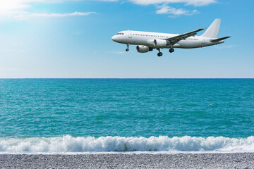 Fototapeta na wymiar Flight of the plane above the ocean.