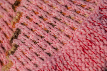 Texture: handmade wool jersey. Traditional creativity of Siberia in Russia.