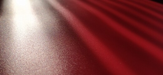 blurred striped red background. Play of light and shadow. Light rays. Divine or heavenly radiance...
