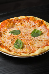 Margherita pizza close up in restaurant