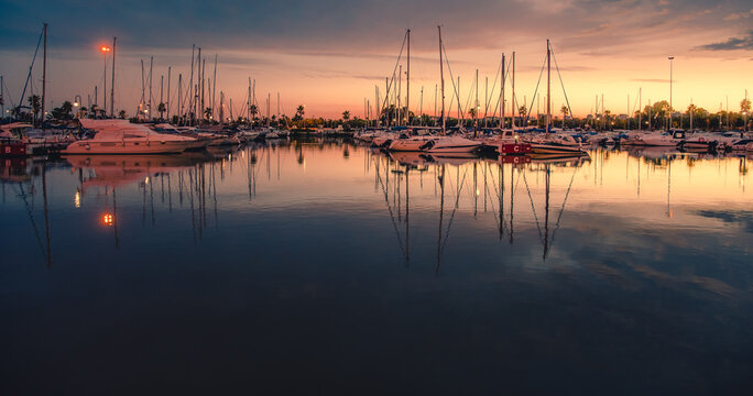 Yachts, sailboats and other pleasure boats docked at the docks of the Guardamar del Segura marina