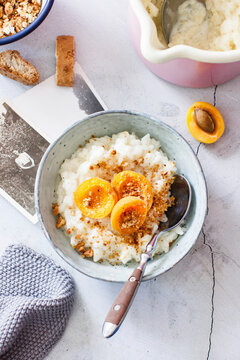 Rice Pudding With Caramelised Apricots And Biscuit Crumbs