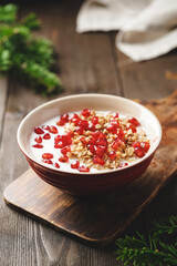 Yoghurt with granola and pomegranate seeds