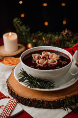 Traditional Christmas Eve soup, polish Borscht with dumplings 