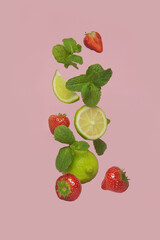  mojito strawberry, lime and mint fall on a pink background