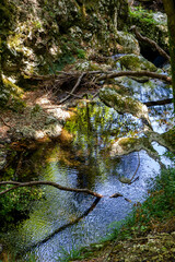 abstract reflection of river Calore in Vallo della Spina in Montella with reflections